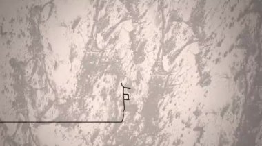 Erkek hentbolcunun gri arka planda top attığı ve şekillendiği animasyon. Küresel spor ve soyut arkaplan kavramı dijital olarak oluşturulmuş video.