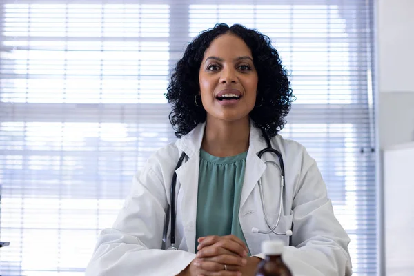 Biracial Female Doctor Sitting Desk Having Video Call Doctor Office — Stock Photo, Image
