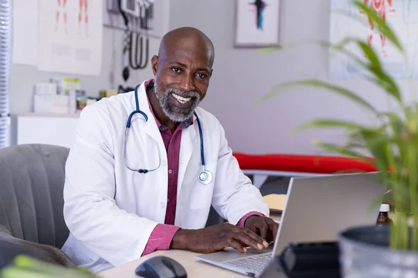 Portrait Happy African American Male Doctor Sitting Desk Using Laptop — Stock Photo, Image