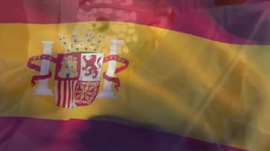 Kadın cerrahın üzerinde İspanyol bayrağı sallayarak hastanedeki erkek cerraha ameliyat maskesi takmasının animasyonu. Tıbbi sağlık teknolojisi kavramı