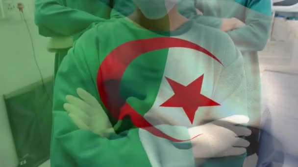 Animatie Van Zwaaien Algeria Vlag Tegen Team Van Diverse Chirurgen — Stockvideo