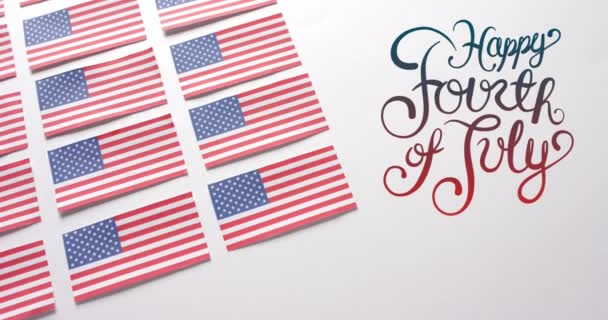 アメリカの国旗を背景に7月4日のテキストのアニメーション アメリカ独立記念日 伝統とお祝いのコンセプトデジタル生成ビデオ — ストック動画
