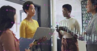 Animation of financial data processing over diverse business people in office. Global business, finances, computing and data processing concept digitally generated video.
