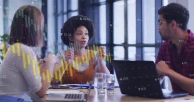 Animation of financial data processing over diverse business people in office. Global business, finances, computing and data processing concept digitally generated video.