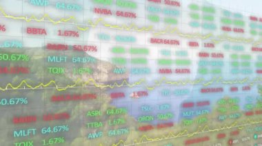 Animation of financial data processing over cityscape. Global business, finances, computing and data processing concept digitally generated video.