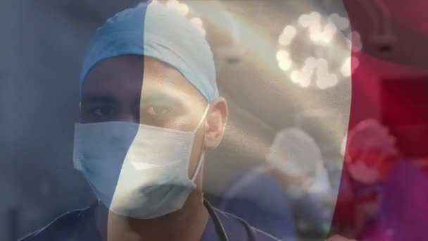 Анимация Флага Франции Над Двуличным Хирургом Мужчиной Маске Лица Глобальная — стоковое видео