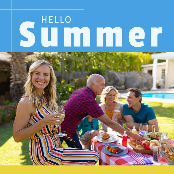 Composition of hello summer text over caucasian family having drink in summer garden. Hello summer, family time and vacation concept digitally generated image.