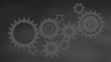 Gri arka planda hareket eden dişlilerin animasyonu. Sosyal medya ve dijital arayüz kavramı, dijital olarak oluşturulmuş video.