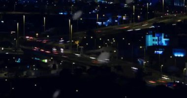 Animation of financial data processing over cityscape. Global business, finances, computing and data processing concept digitally generated video.
