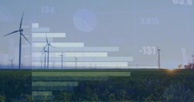 Çayırlarda gri gökyüzüne karşı dönen yel değirmenlerinin istatistiksel veri işleme sistemi. İş verileri ve yenilenebilir enerji teknolojisi kavramı