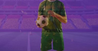 Kafkas futbolcusu ve Almanya bayrağının üzerine düşen konfeti animasyonu spor stadyumunda. Spor, rekabet, kazanma ve kutlama konsepti dijital olarak oluşturulmuş video.