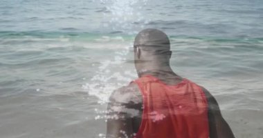 Afrika kökenli Amerikalı bir adamın üzerinde deniz manzarası canlandırması. Küresel bağlantılar, refah, zindelik ve dijital olarak üretilen sağlıklı yaşam tarzı konsepti.