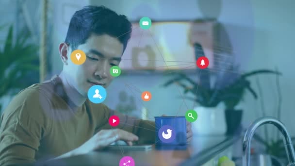 Animation Connected Icons Forming Globe Asian Man Drinking Coffee Using — Stock Video