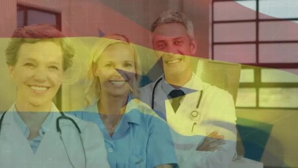 Animation Waving Ghana Flag Team Diverse Doctors Health Workers Smiling — Stock Video