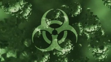 Biyolojik tehlike sembolü ve yeşil arka planda yüzen çoklu covid-19 hücrelerinin animasyonu. Küresel acil durum ve covid-19 salgını