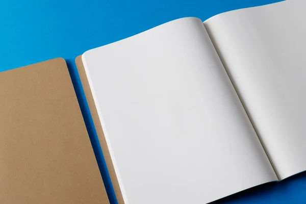 Close Beige Notebook Open Book Copy Space Blue Background Literature — Stock Photo, Image