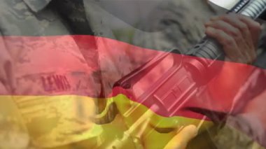 Çeşitli askerler üzerinde Alman bayrağının animasyonu. Ulusal vatanseverlik, silahlı kuvvetler ve savunma konsepti dijital olarak oluşturulmuş video.