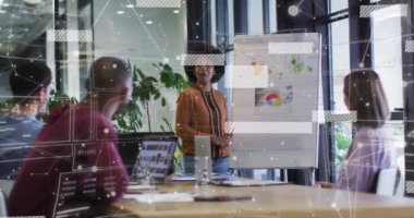 Animation of financial data processing over diverse business people in office. Global business, finances, computing and data processing concept digitally generated video.