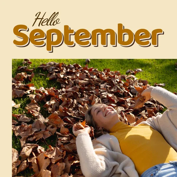 Hello September Text Browns Happy Caucasian Woman Lying Pile Fallen — Zdjęcie stockowe