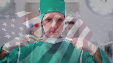 Hastanede cerrahi maske takan beyaz kadın cerrahın üzerinde ABD bayrağı sallama animasyonu. Tıbbi sağlık ve vatanseverlik kavramı
