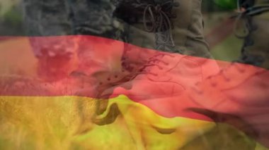 Çeşitli erkek askerler üzerinde Alman bayrağının animasyonu. Vatanseverlik, silahlı kuvvetler ve dijital olarak üretilen ulusal savunma konsepti.