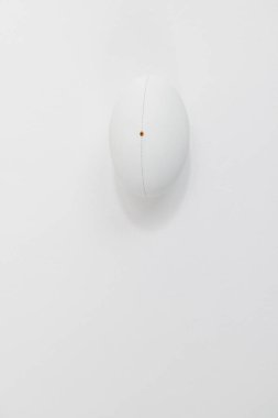 White rugby ball with copy space on white background. Rugby, sport, international, competition and games digitally generated image.