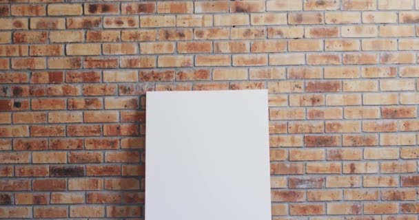 Video White Canvas Sign Copy Space Floor Brick Wall Background — Stock Video