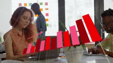 Animation of financial data processing over diverse business people in office. Global business, finances, computing and data processing concept digitally generated video.