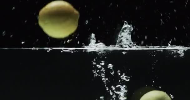 Video Three Limes Underwater Copy Space Black Background Fresh Food — Stock Video