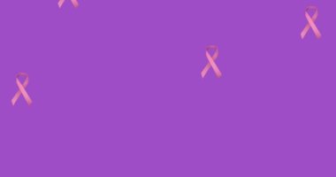 Pembe farkındalık kurdeleleri ve umut metninin mor arka planda daire şeklinde canlandırılması. Kanser farkındalığı, mücadeleye katılma, umut, ruh, sağlık, destek, sağlık ve uyanıklık..