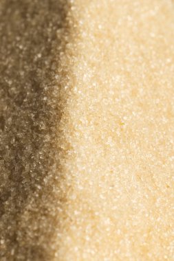 Kum tanelerini kapatın ve uzay arkaplanını kopyalayın. Kum, doku, şekil ve renk kavramı.