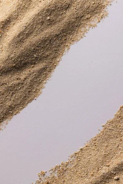 砂粒のクローズアップとホワイトバックグラウンドのコピースペース サンド テクスチャ カラーコンセプト — ストック写真