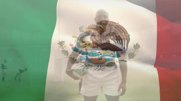 Animacja Meksykańskiej Flagi Afrykańskiego Amerykańskiego Męskiego Gracza Piłką Rugby Stojącą — Wideo stockowe