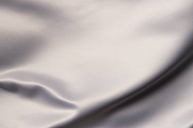 Fotokopi arkaplanı olan beyaz parlak ipek kumaşı kapat. Doku, kumaş, kumaş, renk ve malzeme.