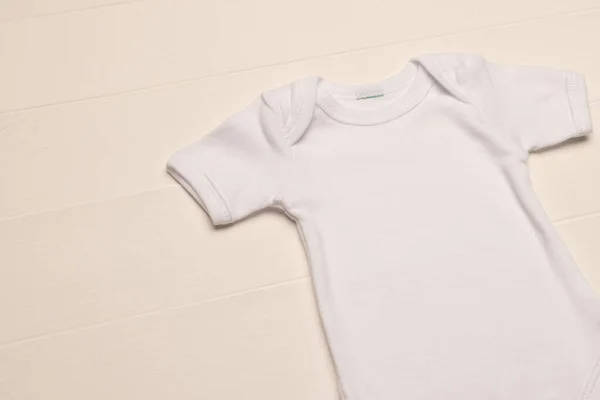 Flat Lay White Baby Grow Copy Space White Board Background — Stock Photo, Image