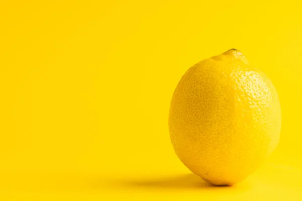 stock image Close up of lemon and copy space on yellow background. Fruit, exotic fruit, food, freshness and colour concept.