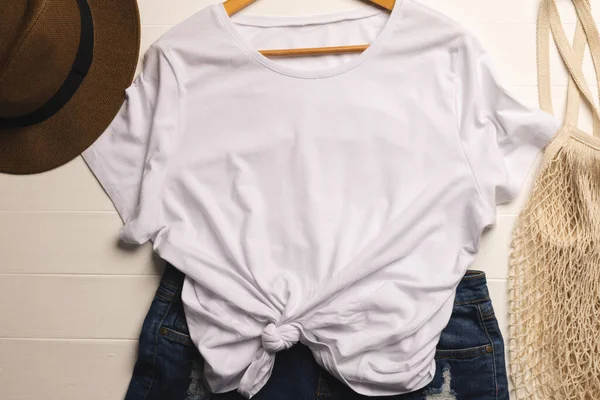 Flat Lay White Shirt Sunhat Net Bag Denim Skirt Copy — Stock Photo, Image