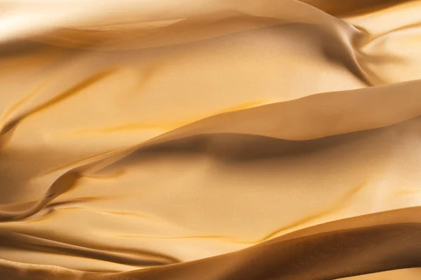 Nahaufnahme Aus Goldglänzendem Seidenstoff Mit Kopierraum Hintergrund Textur Stoff Stoff — Stockfoto