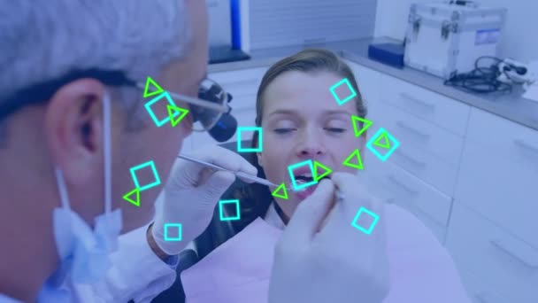 Animacja Sieci Kształtów Nad Białymi Mężczyznami Dentystami Pacjentkami Globalna Stomatologia — Wideo stockowe