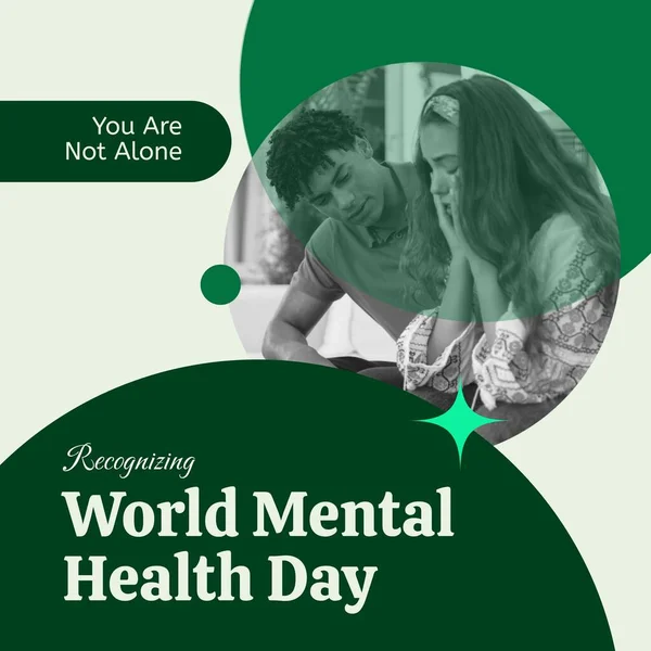 Composition of world mental health day text over sad diverse couple. Mental health day, depression and mental health awareness concept digitally generated image.