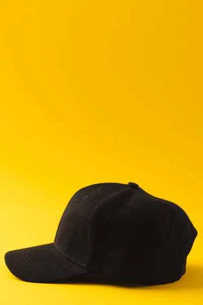 Black Baseball Cap Copy Space Yellow Background Fashion Clothes Colour — Stock Photo, Image