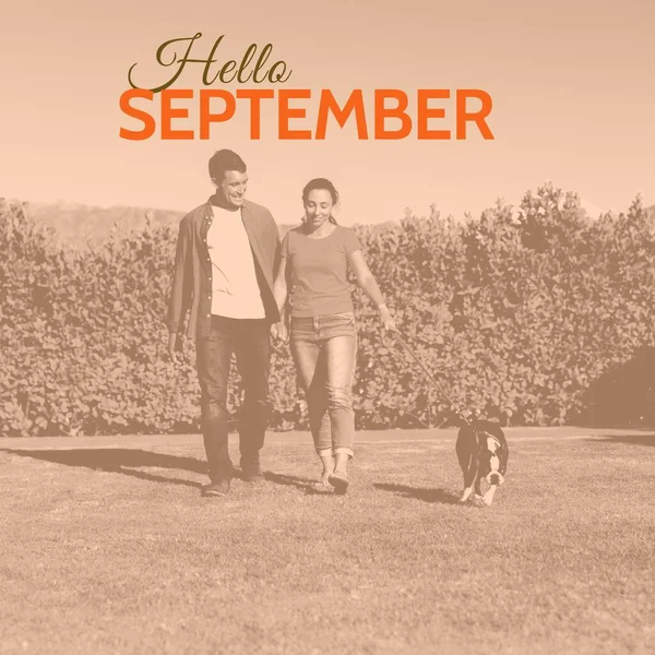 Composto Texto Olá Setembro Sobre Casal Caucasiano Com Cão Jardim — Fotografia de Stock
