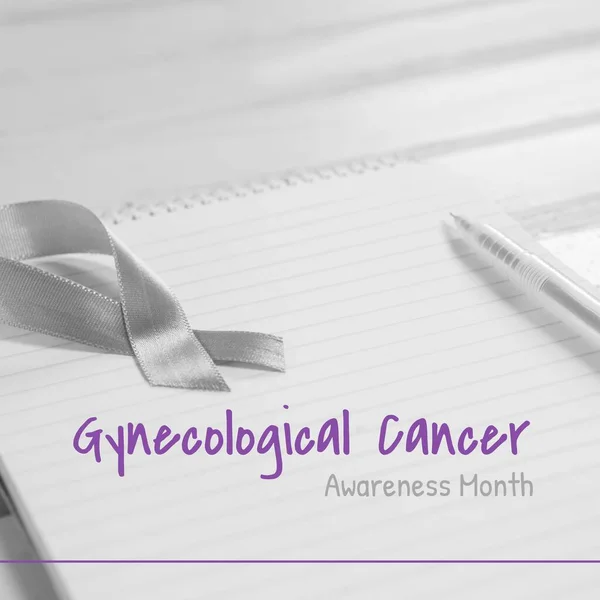 Composite of gynecological cancer awareness month over ribbon on notebook background. Gynecological cancer awareness, woman\'s health and prevention concept digitally generated image.