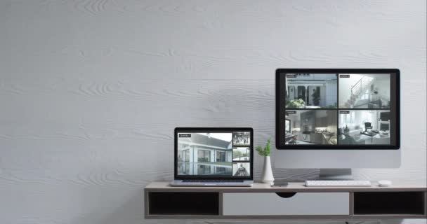 壁面上装有计算机显示器和笔记本电脑 屏幕上有摄像头 动作缓慢 家庭生活和通信 — 图库视频影像