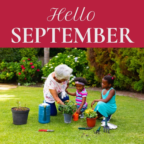 Composto Texto Olá Setembro Sobre Africano Avó Americana Netas Jardinagem — Fotografia de Stock