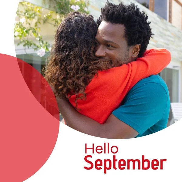 Composto Texto Olá Setembro Sobre Casal Biracial Abraçando Olá Setembro — Fotografia de Stock