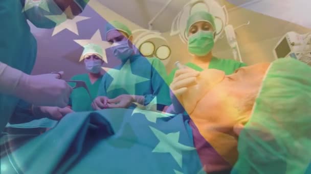 Animation Flag Bosnia Herzegovina Diverse Surgeons Performing Surgery Patient Digital — Stock Video
