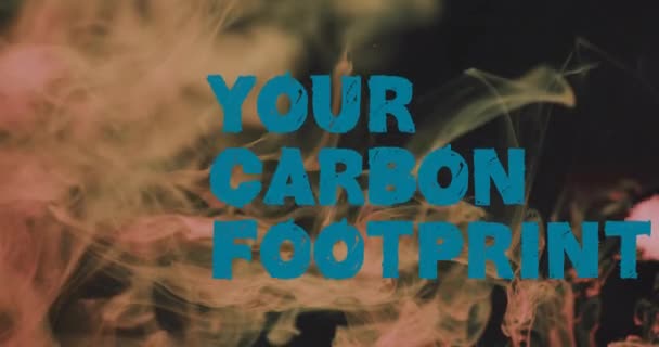 Анимация Текста Углеродного Следа Поверх Оранжевой Жидкости Черном Фоне Концепция — стоковое видео