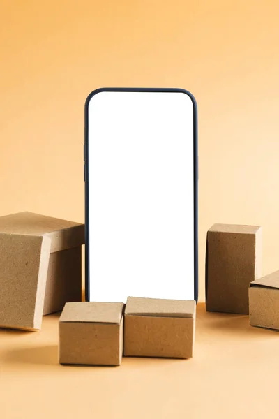 Vertical Image Smartphone Blank Screen Cardboard Boxes Copy Space Yellow — Stock Photo, Image