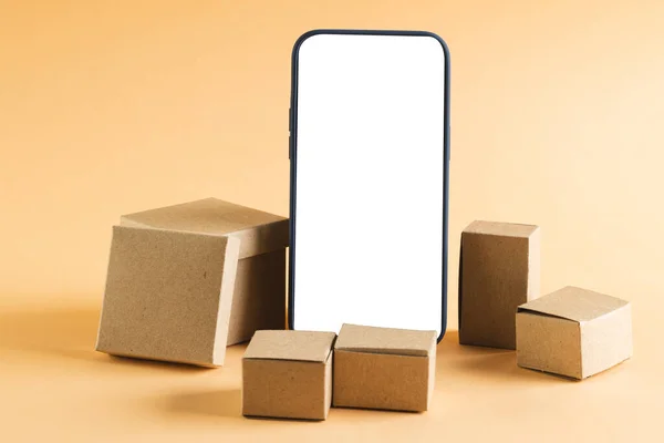Smartphone Blank Screen Cardboard Boxes Copy Space Yellow Background Cyber — Stock Photo, Image